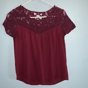 Plum colored baby doll lace shirt.